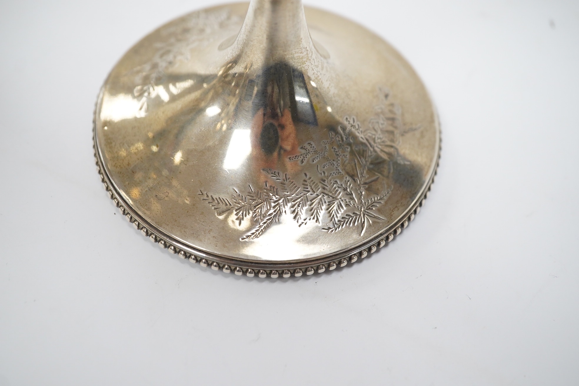 A Victorian engraved silver presentation goblet, with Masonic inscription, London, 1880, 19.5cm, together with a modern silver presentation goblet and a silver two handled presentation trophy cup and cover, 20.2oz. Condi